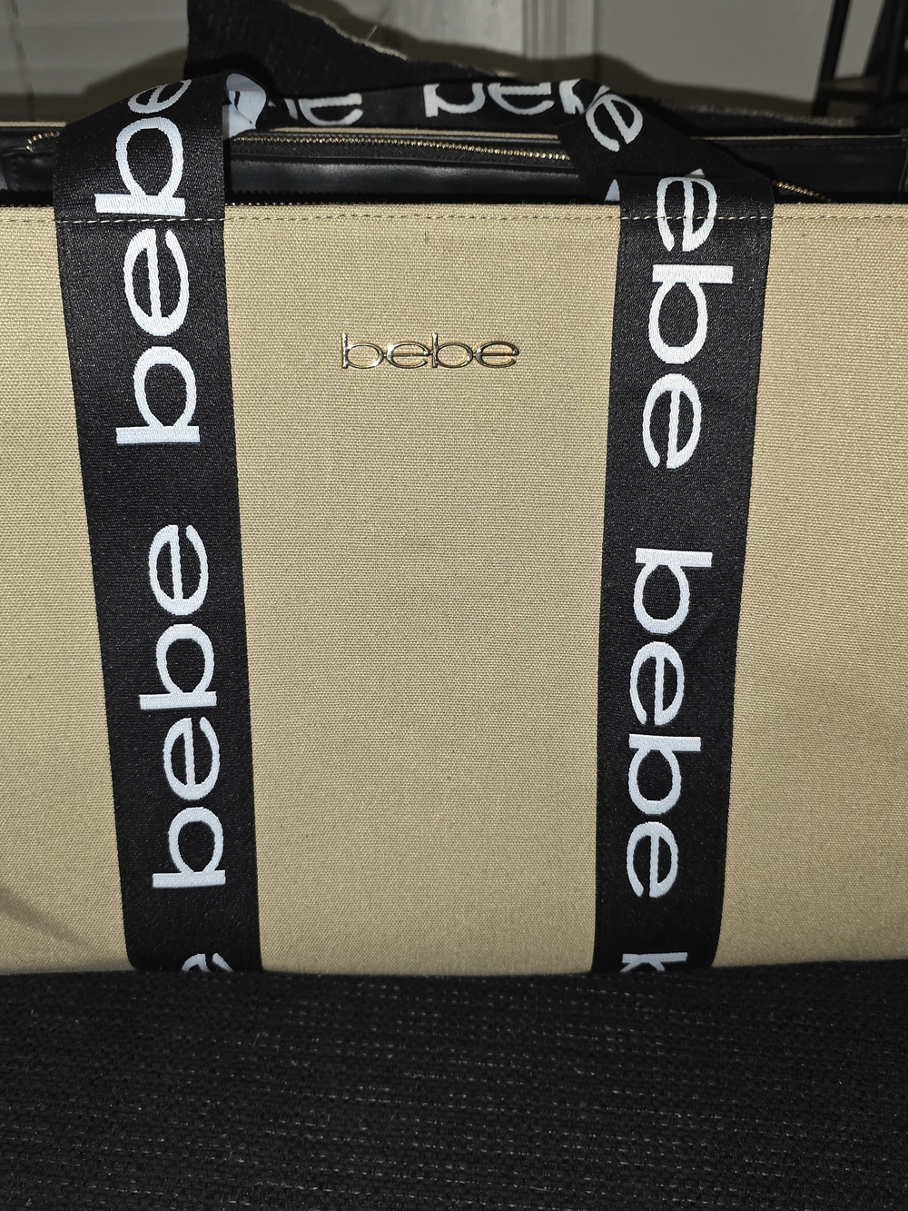 bebe Tan Canvas Duffel with Black Branded Straps